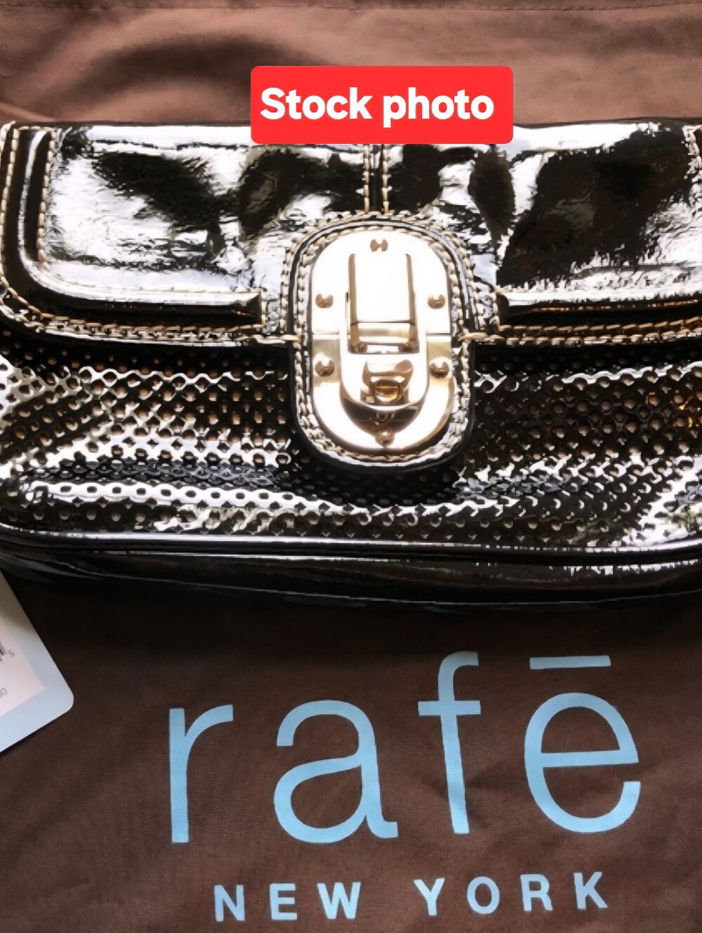Rafe NY, Beautiful Black Patent Perforated Leather Clutch with Silver Hardware.